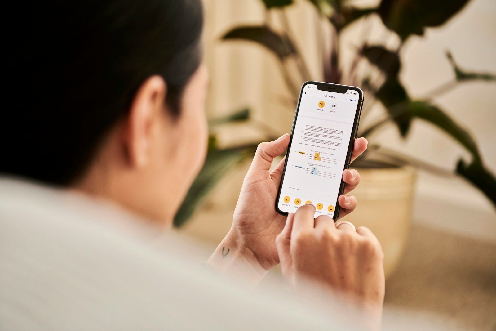 Person using the iPhone Control Center code scanner to scan a QR code